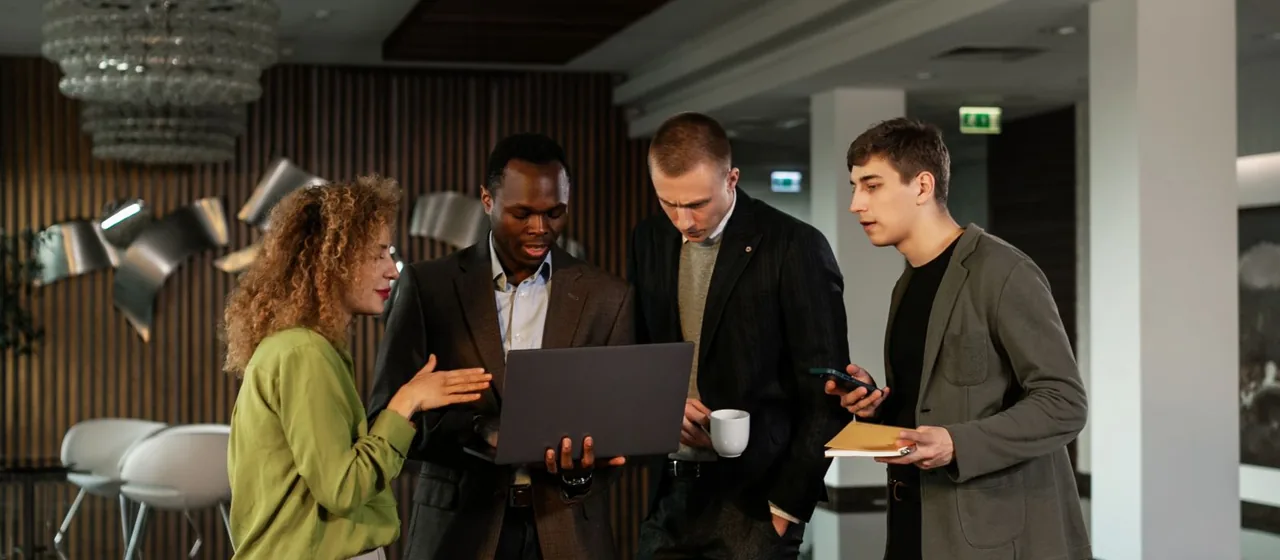 Professionals discussing ideas together in a modern office